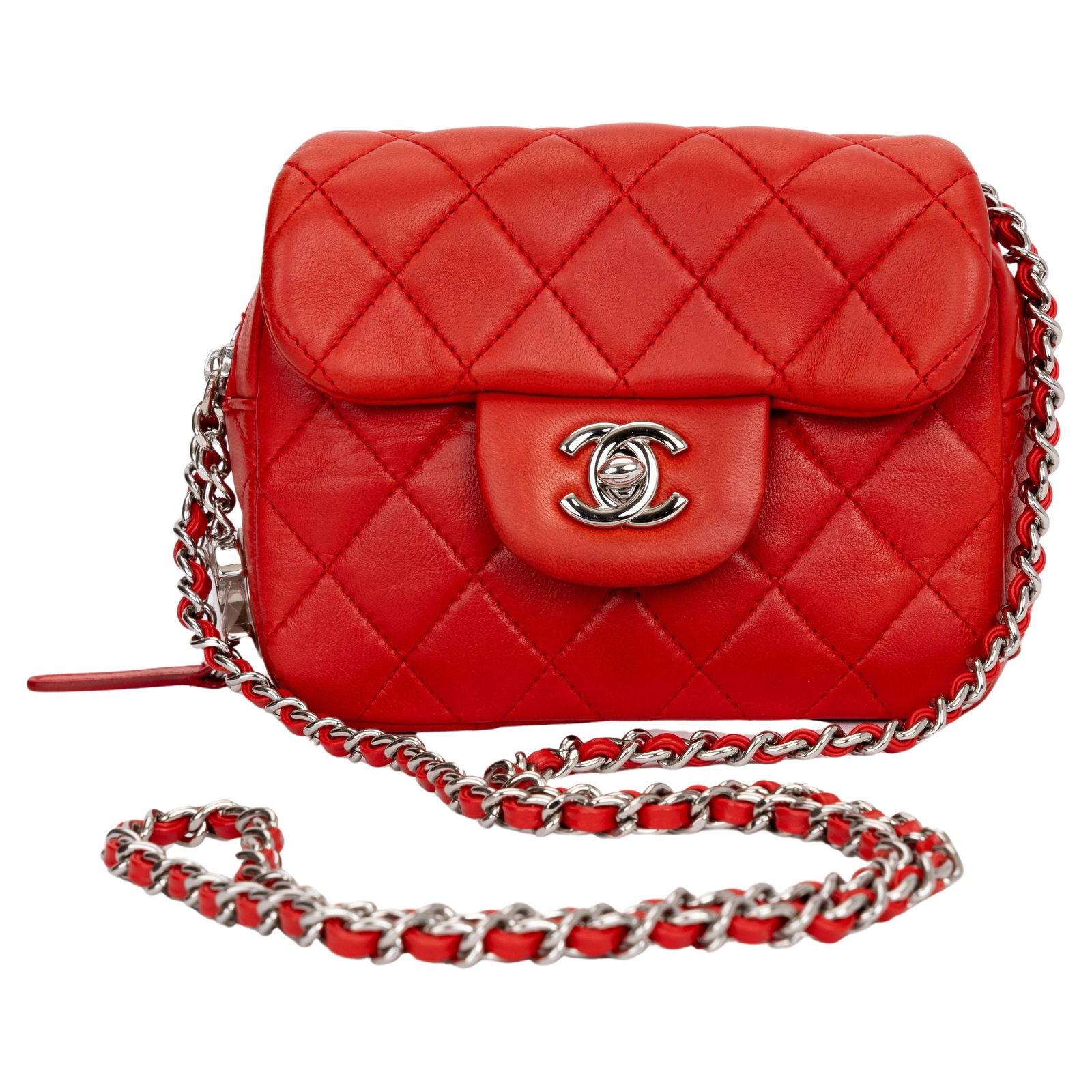 Chanel Red Lambskin Crossbody Bag with CC Lock and Hologram: Chanel Red Lambskin Crossbody Bag with CC Lock and Hologram This Chanel Red Leather Crossbody Flap Bag is a stunning accessory crafted from luxurious lambskin. It features a distinctive intertwined le