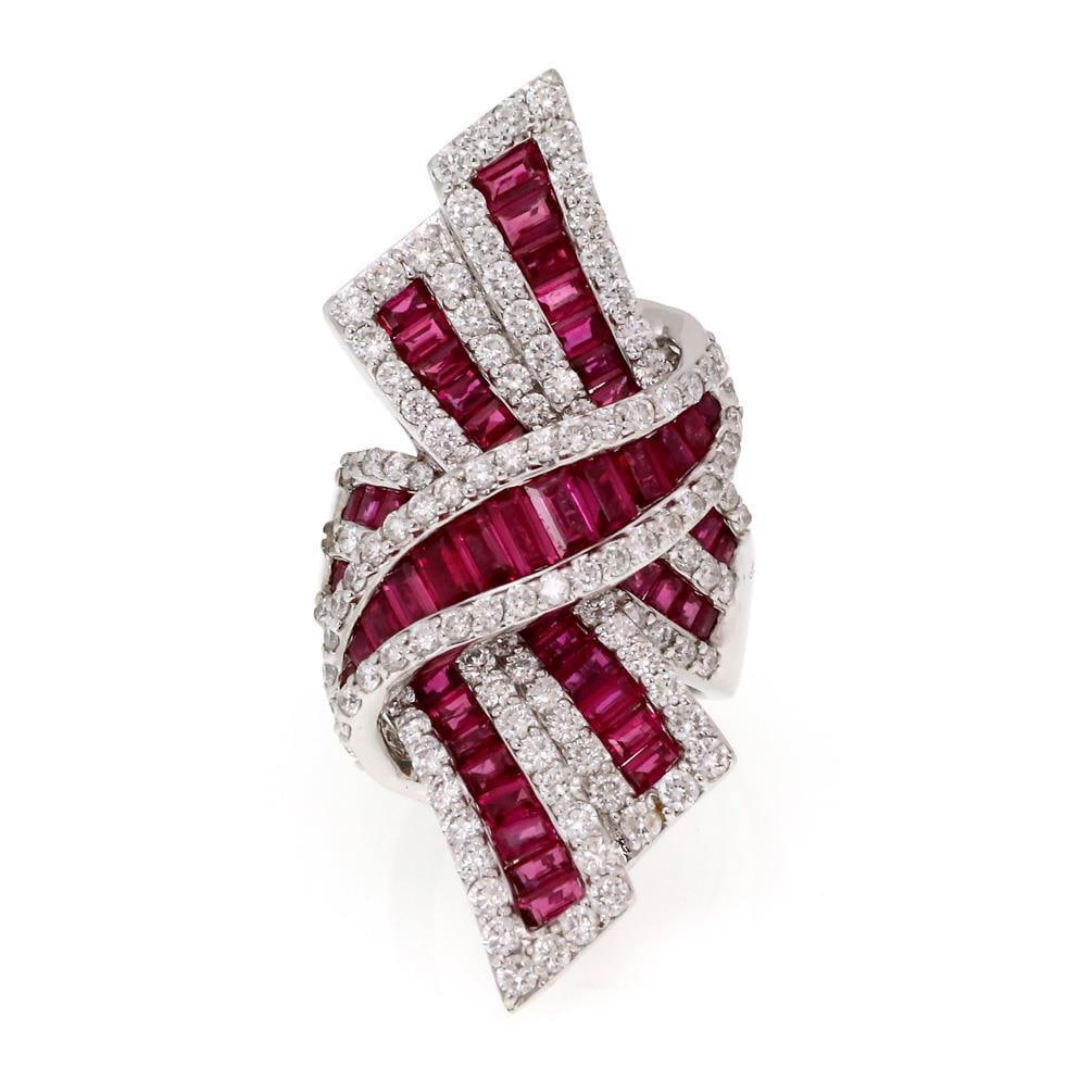 Large 18k White Gold Diamond Ruby Bow Ring 6.00ct SJTau: Large 18k White Gold Diamond Ruby Bow Ring 6.00ct SJTau This stunning ring is a remarkable piece crafted from 18k white gold, featuring a tapered polished band that transitions into five rows adorned