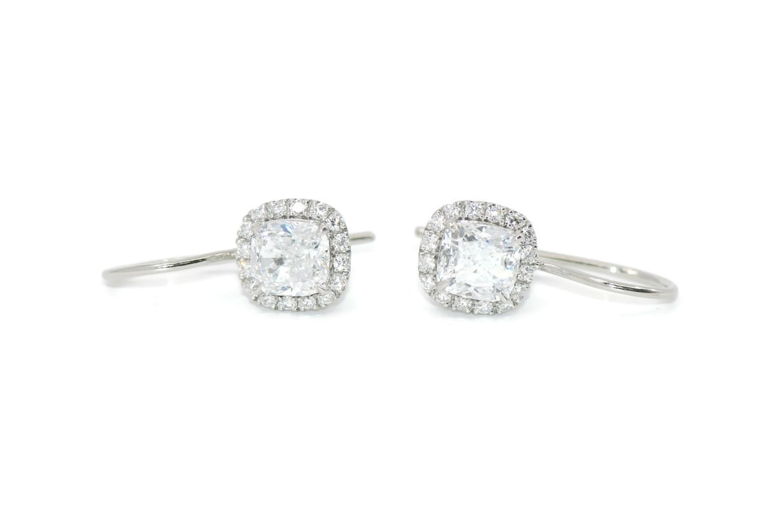 Harry Winston 2.02 CTW D/VVS2 Platinum Drop Earrings with GIA Certification: Harry Winston 2.02 CTW D/VVS2 Platinum Drop Earrings with GIA Certification Enhance your elegance with these stunning Harry Winston diamond earrings, crafted in luxurious platinum. Each earring featur