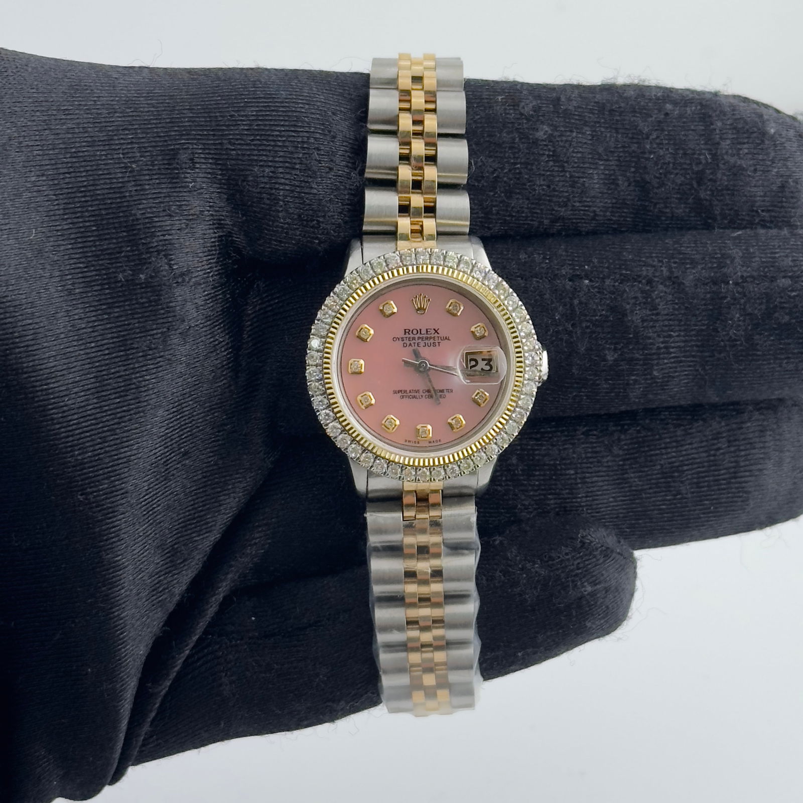 Ladies Aftermarket Pink MOP Diamond Dial Datejust 6516 on Jubilee Bracelet: Ladies Aftermarket Pink MOP Diamond Dial Datejust 6516 on Jubilee Bracelet This ladies' Rolex Datejust features an aftermarket pink mother of pearl diamond dial and is paired with an aftermarket Jubil