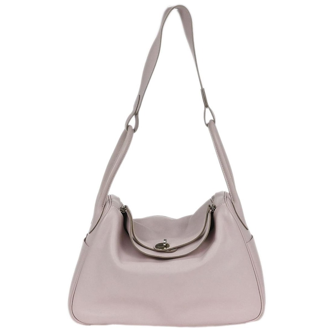 Hermes Lindy 34 Rose Dragee Leather Shoulder Bag: Hermes Lindy 34 Rose Dragee Leather Shoulder Bag This exquisite Hermes Rose Dragee Swift Lindy 34 Shoulder Bag is a perfect blend of style and functionality. Crafted from high-quality leather, this me