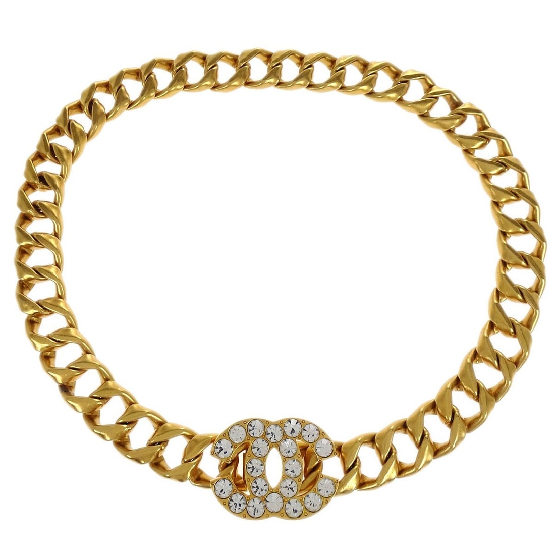 Chanel Vintage Gold Chain Belt with Rhinestones 95P Charm: Chanel Vintage Gold Chain Belt with Rhinestones 95P Charm This exquisite Chanel chain belt features a stunning gold-plated finish and is adorned with dazzling rhinestones, creating a glamorous accesso