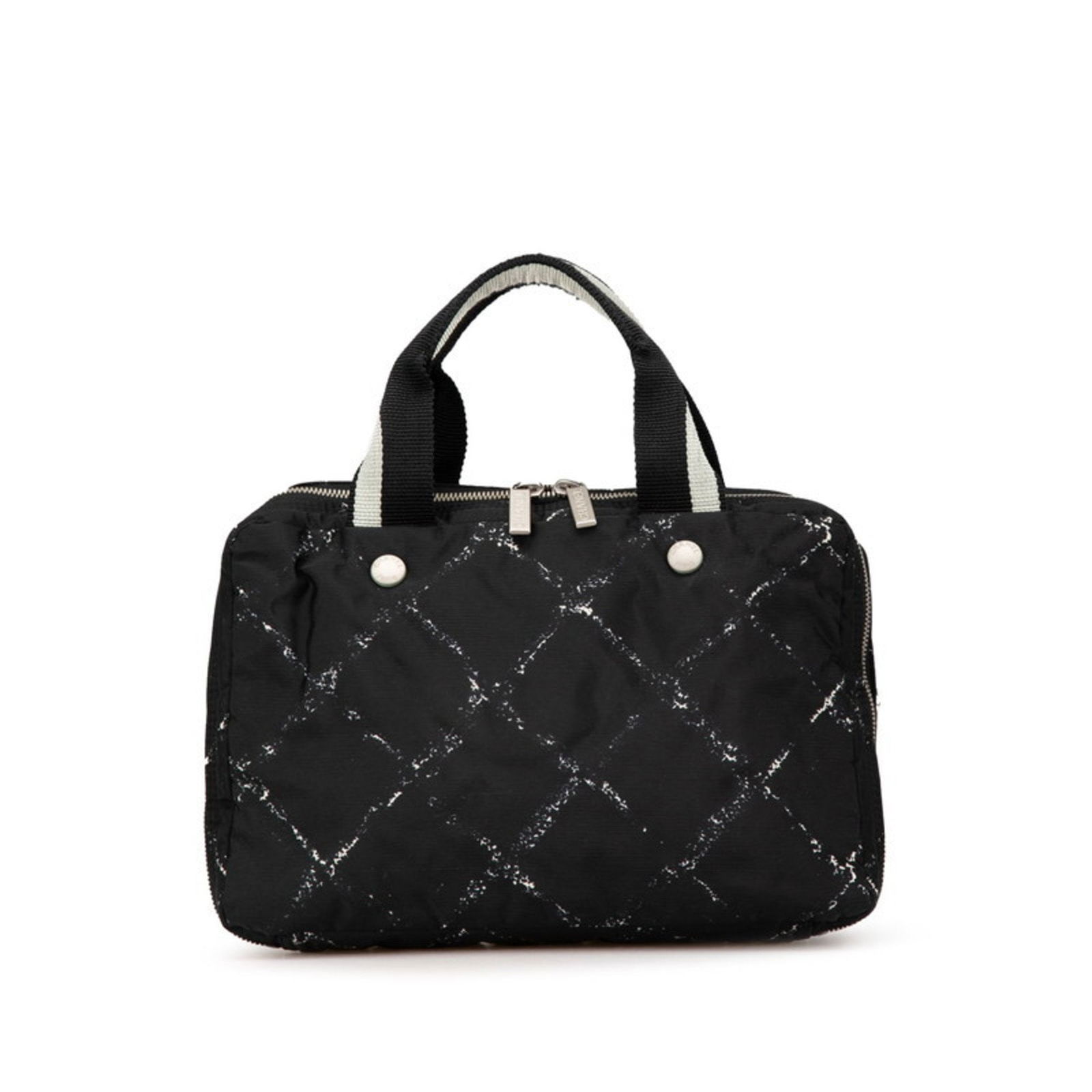 Black Nylon Chanel Travel Line Handbag 19cm x 30cm x 15cm: Black Nylon Chanel Travel Line Handbag 19cm x 30cm x 15cm This Chanel Travel Line handbag features a black nylon exterior and a spacious design. Made in France, it offers practical functionality with