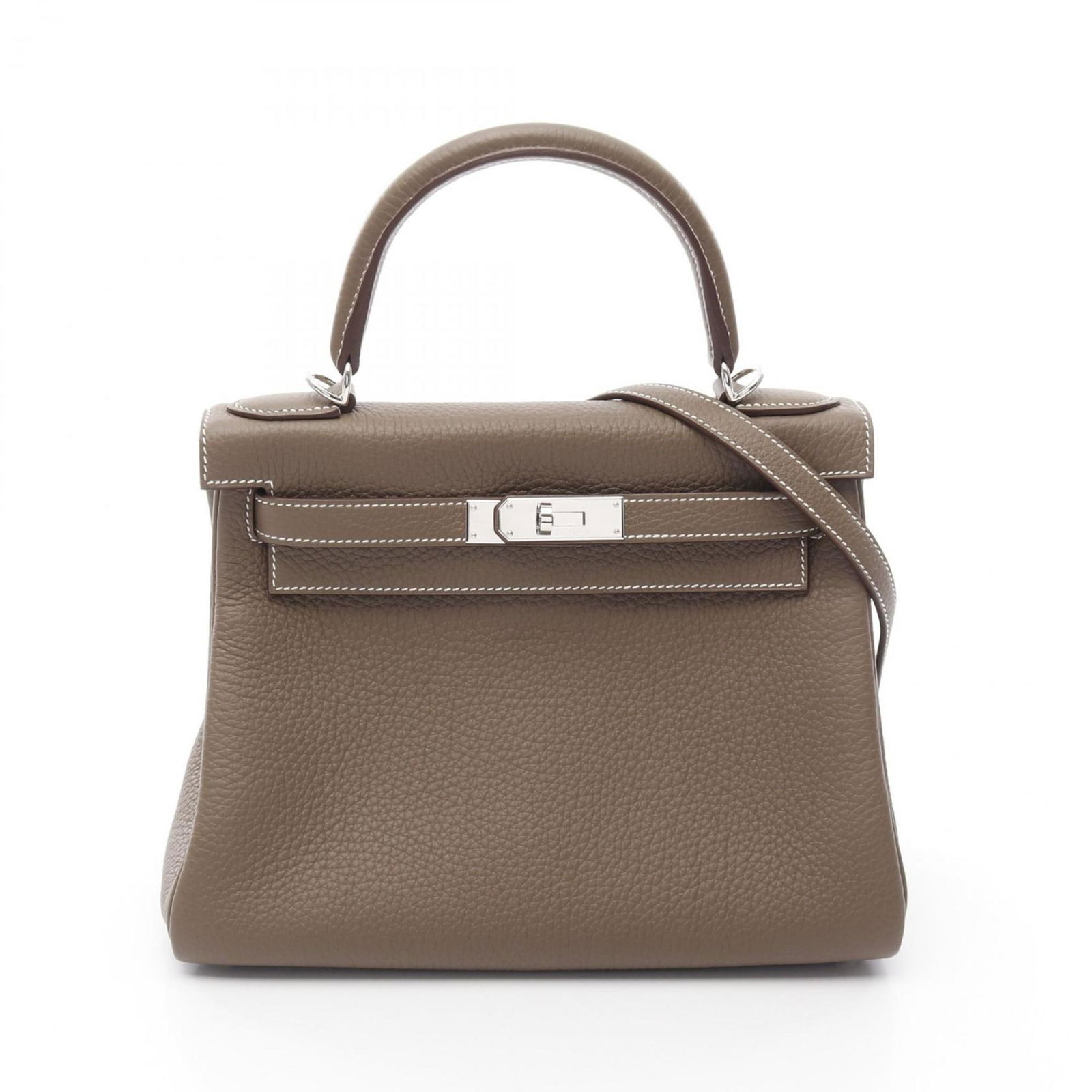 Brown Leather Kelly 28 Handbag by Hermes France: Brown Leather Kelly 28 Handbag by Hermes France The Hermes Kelly 28 is a sophisticated handbag crafted from brown leather, designed for women. It features a structured silhouette and showcases meticul