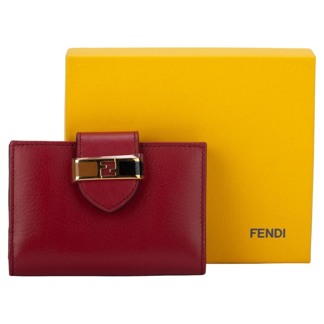 Fendi Burgundy Veal Wallet with Enamel and Gold Hardware: Fendi Burgundy Veal Wallet with Enamel and Gold Hardware This exquisite Fendi wallet in a rich burgundy color is crafted from luxurious veal leather. The wallet features elegant enamel and gold hardwa