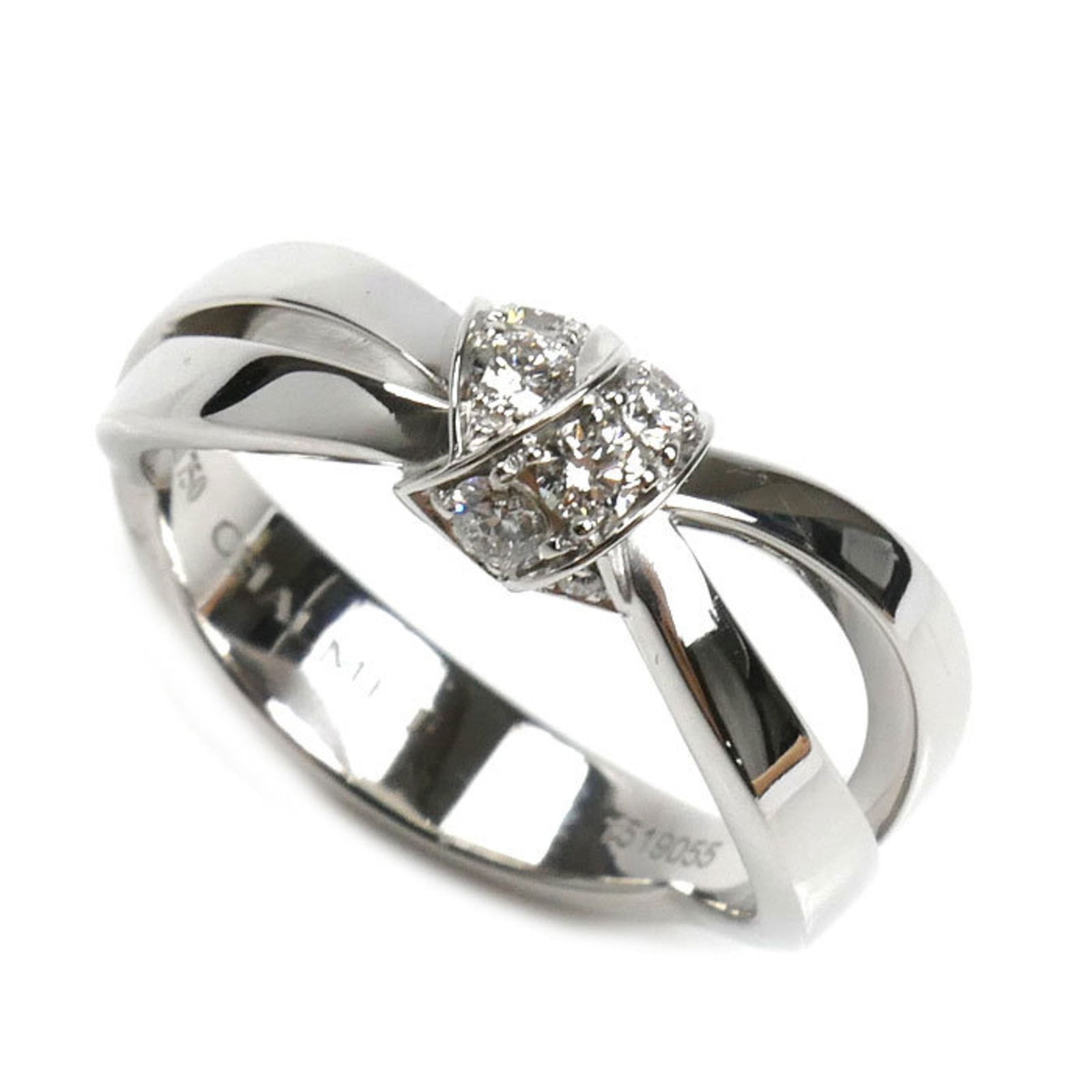 White Gold Ring by Chaumet Size 6 Silver Tone: White Gold Ring by Chaumet Size 6 Silver Tone This Chaumet ring features a sleek silver color crafted from white gold, designed for women. Made in France, the ring is in good condition with only insig