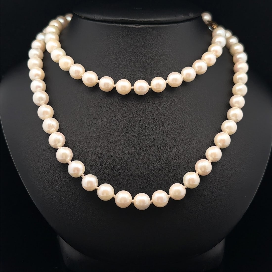 24" Cultured Pearl Necklace with 14k Yellow Gold Clasp: 24" Cultured Pearl Necklace with 14k Yellow Gold Clasp This exquisite 24" strand necklace features 80 genuine cultured pearls, each with a round bead shape and a beautiful white color, measuring appro