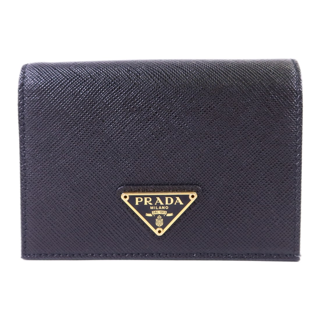 Black Calfskin Bi-fold Wallet by PRADA with Gold Hardware: Black Calfskin Bi-fold Wallet by PRADA with Gold Hardware This PRADA bi-fold wallet is crafted from black calfskin leather, offering a sleek and timeless accessory. Made in Italy, it features a regula