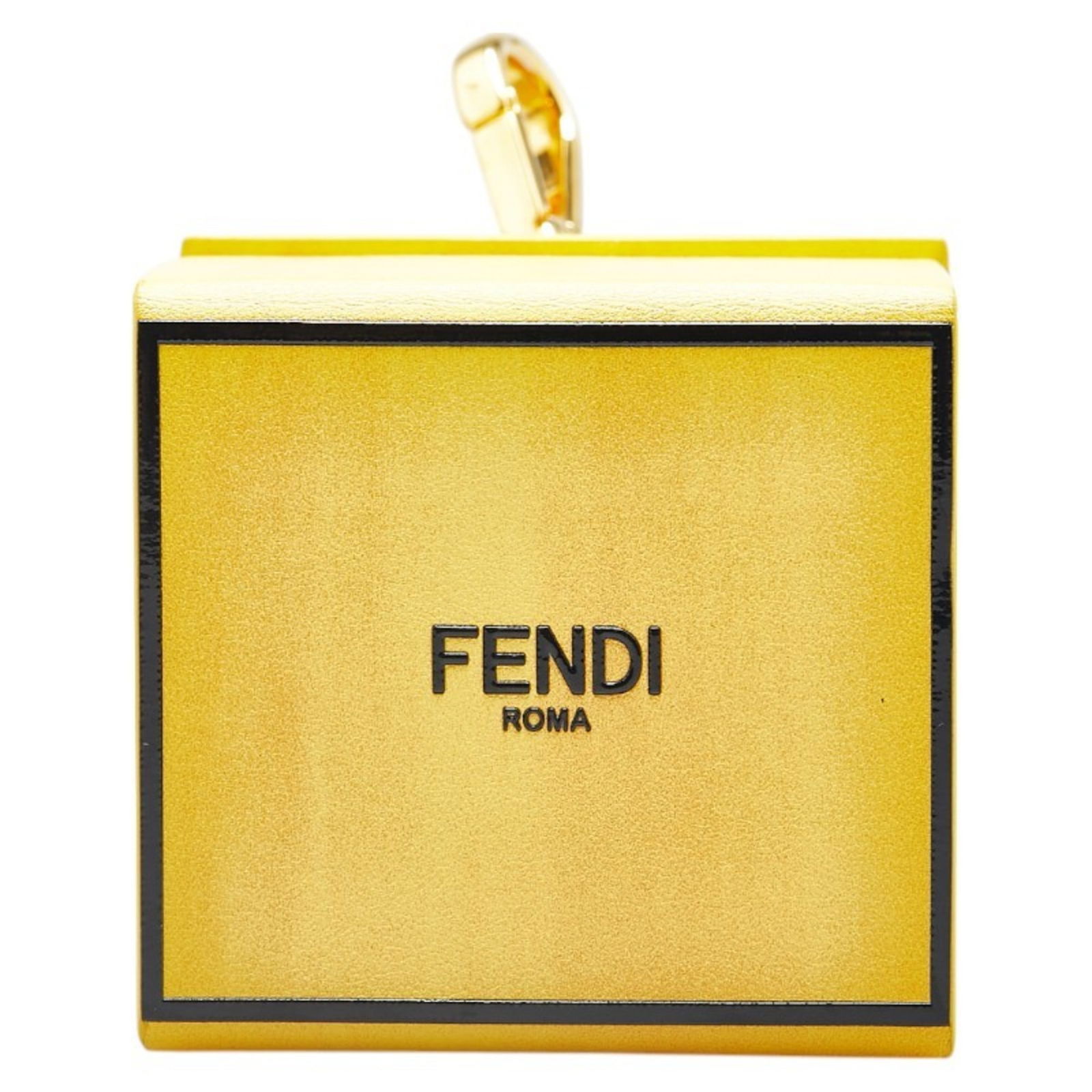 Yellow leather Fendi accessory for women from Italy: Yellow leather Fendi accessory for women from Italy This Fendi women's accessory features a yellow leather construction with slight scratches on both the leather and metal components. Crafted in Italy