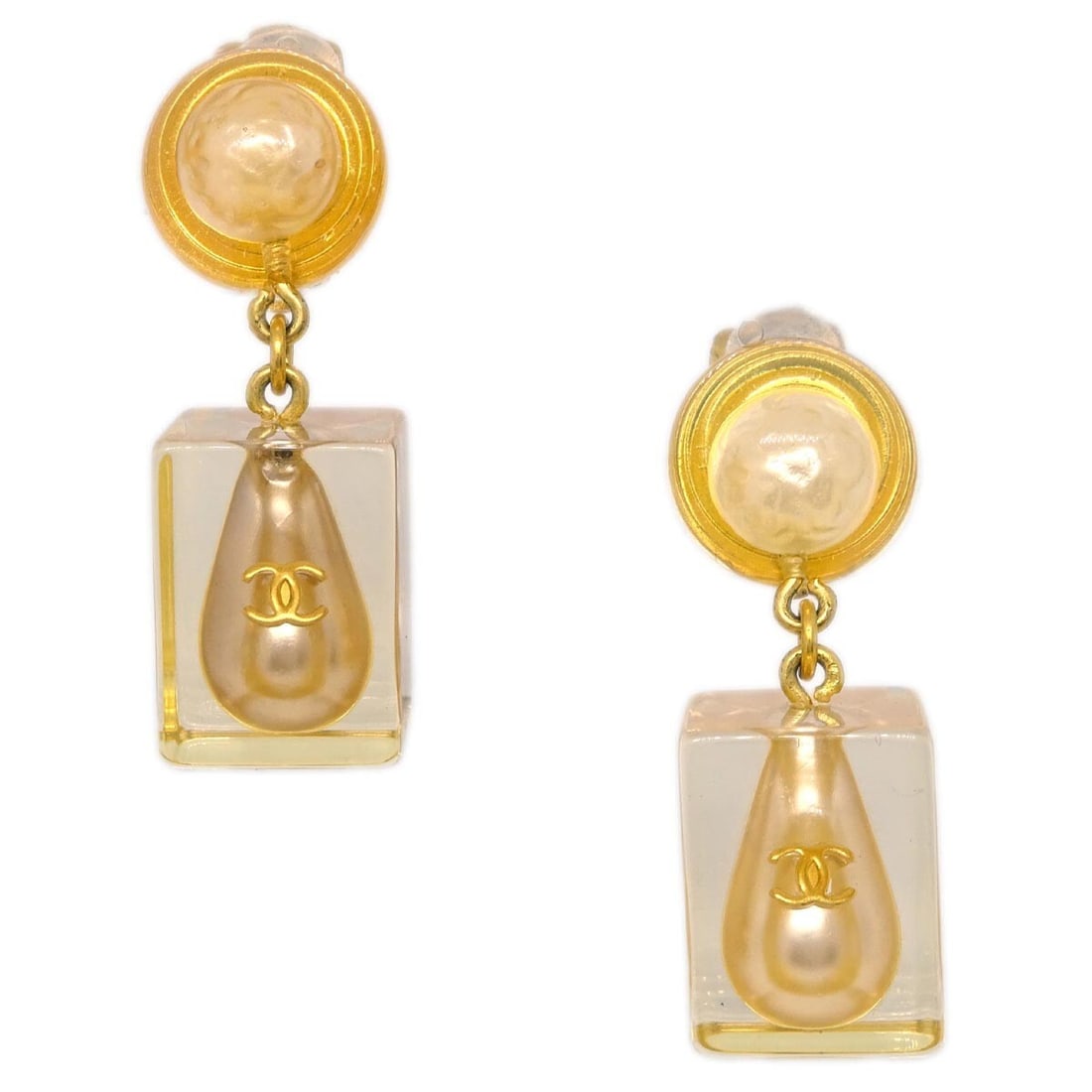 Chanel 97P Dangle Clip-On Earrings Gold Acrylic: Chanel 97P Dangle Clip-On Earrings Gold Acrylic Enhance your accessory collection with these stunning Chanel Dangle Earrings. Crafted with a chic gold acrylic finish, these clip-on earrings feature a