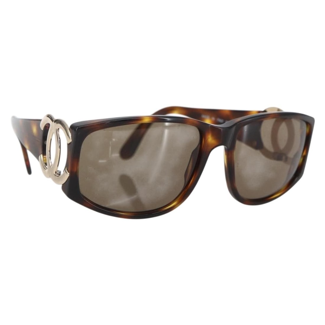 Brown CHANEL Coco Mark Plastic Sunglasses with Case Authenticated: Brown CHANEL Coco Mark Plastic Sunglasses with Case Authenticated These CHANEL COCO Mark sunglasses feature a classic brown plastic frame with iconic CC branding. Crafted in Italy, they come with a su