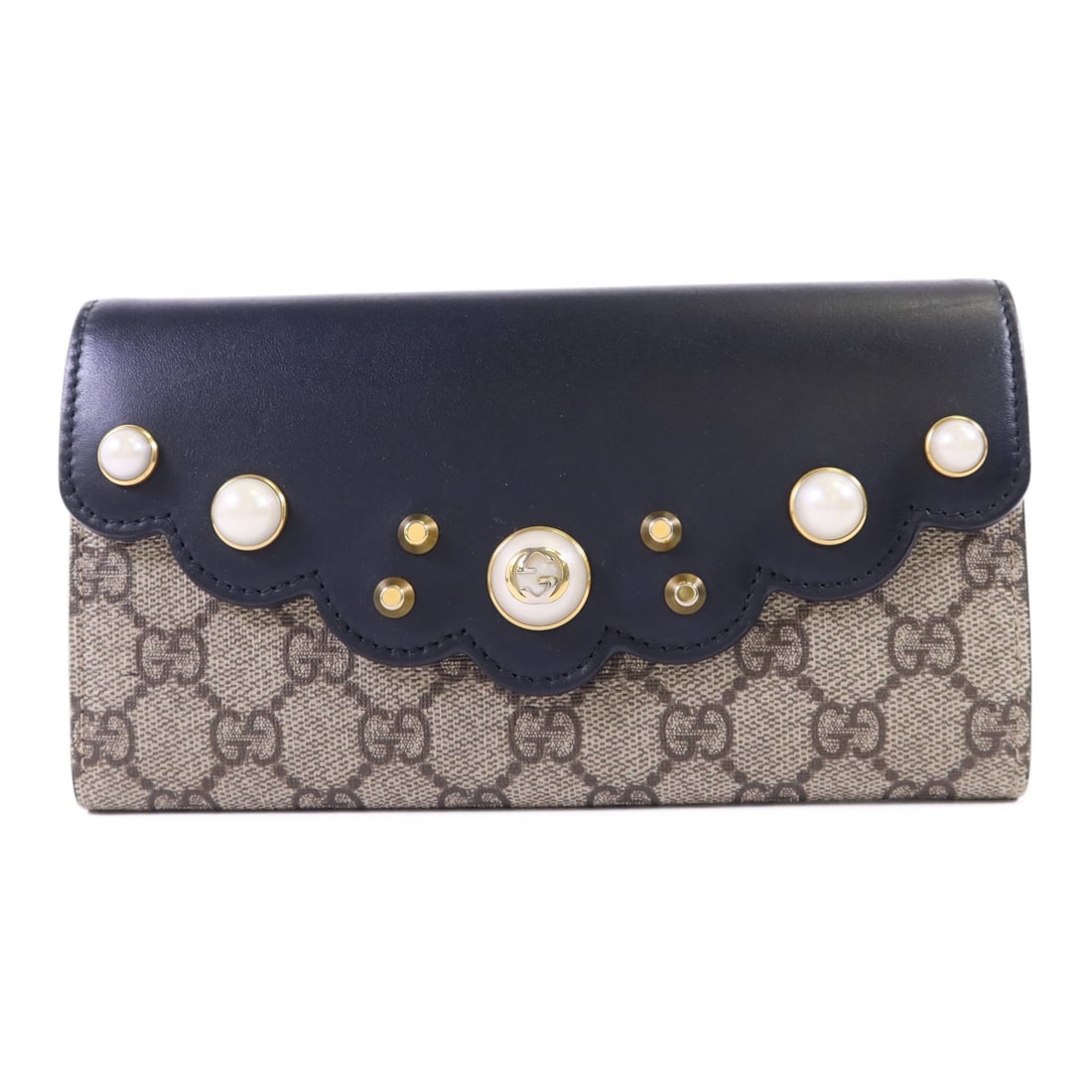 Gucci GG Black Brown Bifold Long Wallet in Calfskin and Coated Canvas: Gucci GG Black Brown Bifold Long Wallet in Calfskin and Coated Canvas This Gucci bifold long wallet features a combination of calfskin leather and coated canvas in black and brown. Designed for functi