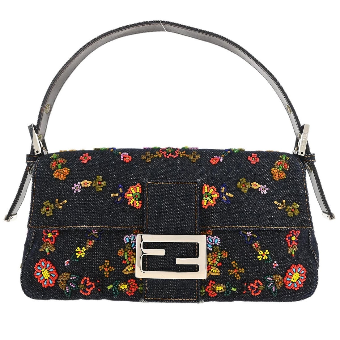 Fendi Baguette Medium Navy Denim Shoulder Bag with Beaded Detailing: Fendi Baguette Medium Navy Denim Shoulder Bag with Beaded Detailing This Fendi Baguette handbag is crafted from navy denim and features intricate beaded accents. The bag has a medium size profile with