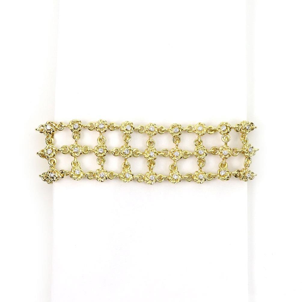 Cassis 1.75ct Diamond 18k Yellow Gold 3 Row Bracelet: Cassis 1.75ct Diamond 18k Yellow Gold 3 Row Bracelet This stunning Cassis bracelet showcases exceptional craftsmanship and elegance. Made from luxurious 18k yellow gold with a polished finish, it feat