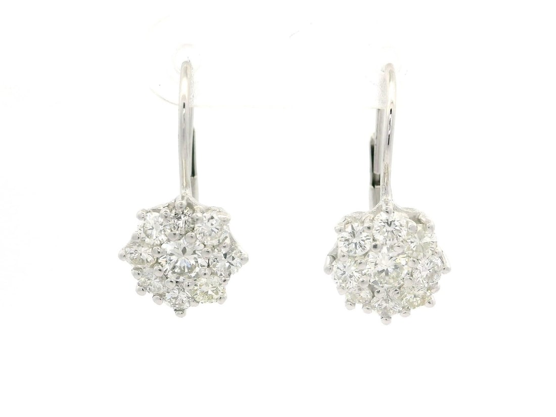 Platinum 1.52ctw Diamond Cluster Drop Earrings White Gold Backings: Platinum 1.52ctw Diamond Cluster Drop Earrings White Gold Backings Elevate your elegance with these stunning Platinum 1.52ctw Fiery Diamond Cluster Drop Earrings. These dangle earrings feature 18 natu