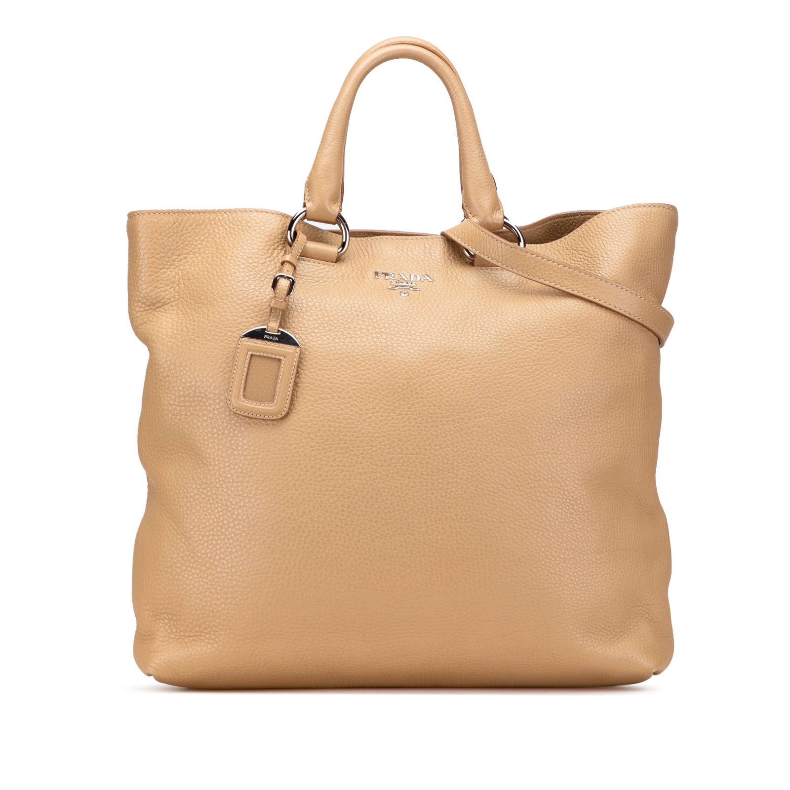 Prada Vitello Daino Convertible Tote Brown Leather Italy: Prada Vitello Daino Convertible Tote Brown Leather Italy The Prada Vitello Daino Open Convertible Tote is a stylish and functional accessory crafted from high-quality vitello daino leather. This versa