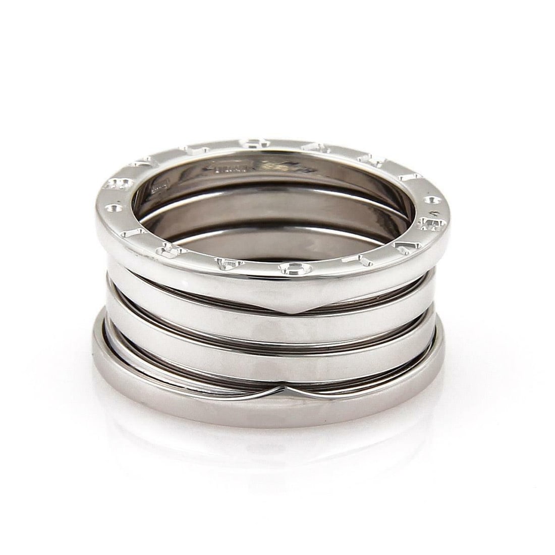 Bvlgari B Zero-1 18k White Gold Flex Band Ring EU 50 US 4.75: Bvlgari B Zero-1 18k White Gold Flex Band Ring EU 50 US 4.75 This exquisite Bulgari B Zero-1 band ring is crafted from authentic 18k white gold, showcasing a stylish flex design. With a comfortable 11