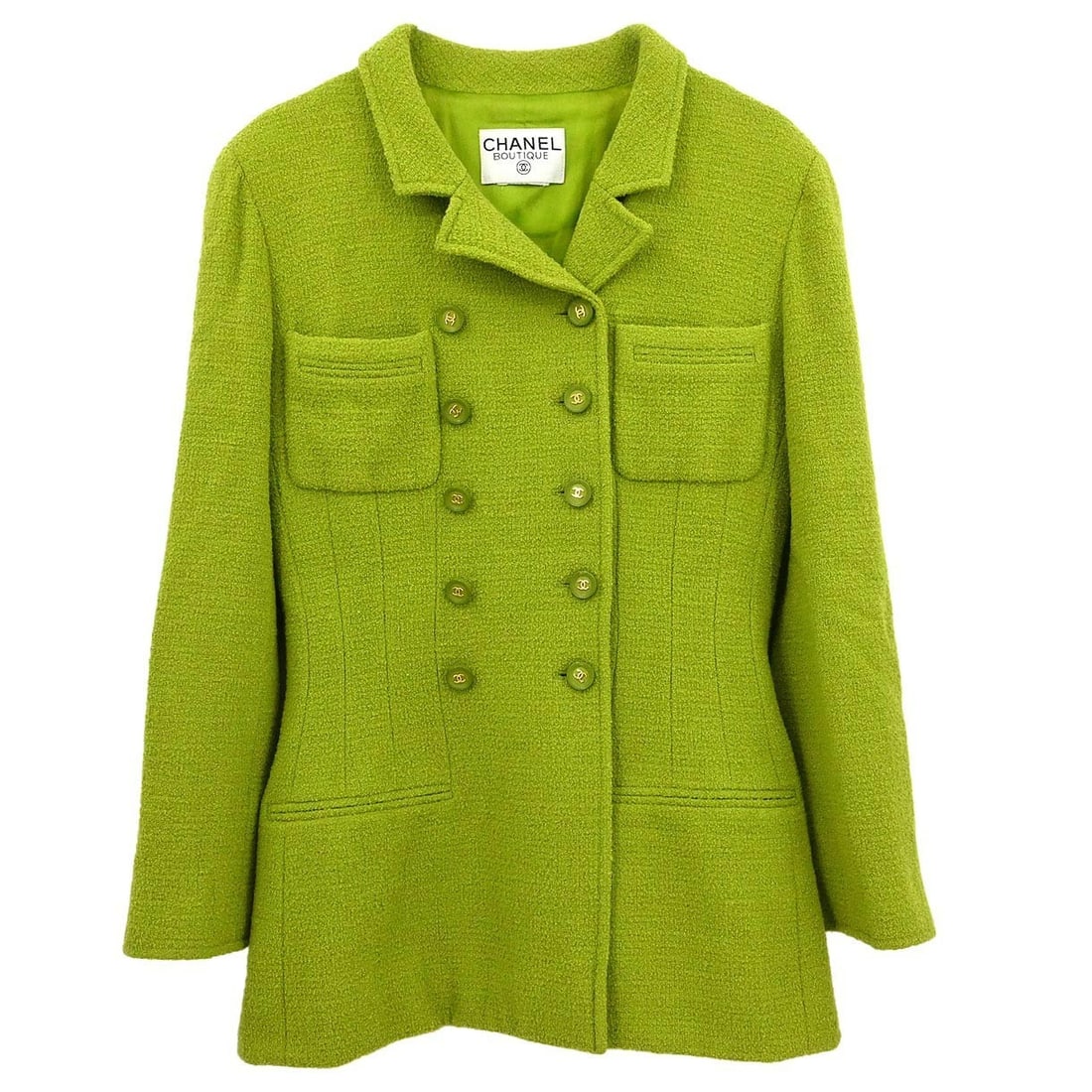 Green Silk Lined Double Breasted Jacket by Chanel: Green Silk Lined Double Breasted Jacket by Chanel This vintage Chanel double-breasted jacket features a mid-length cut and a classic collared design. Crafted with a silk lining for added comfort, it i