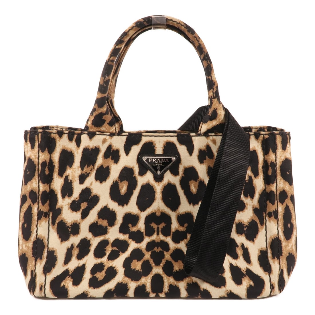 Prada Canvas Brown and Black Two Way Shoulder Bag with Silver Tone Hardware: Prada Canvas Brown and Black Two Way Shoulder Bag with Silver Tone Hardware This Prada 2-way shoulder bag features a stylish combination of brown and black canvas. Crafted in Italy, the bag offers ver