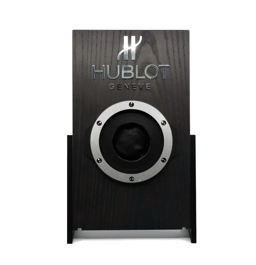 Authentic Hublot Watch Stand Display 16x9 Inches: Authentic Hublot Watch Stand Display 16x9 Inches Showcase your timepiece with this authentic Hublot Watch Stand Display. Designed for elegance and functionality, this watch stand measures 16 x 9 inche