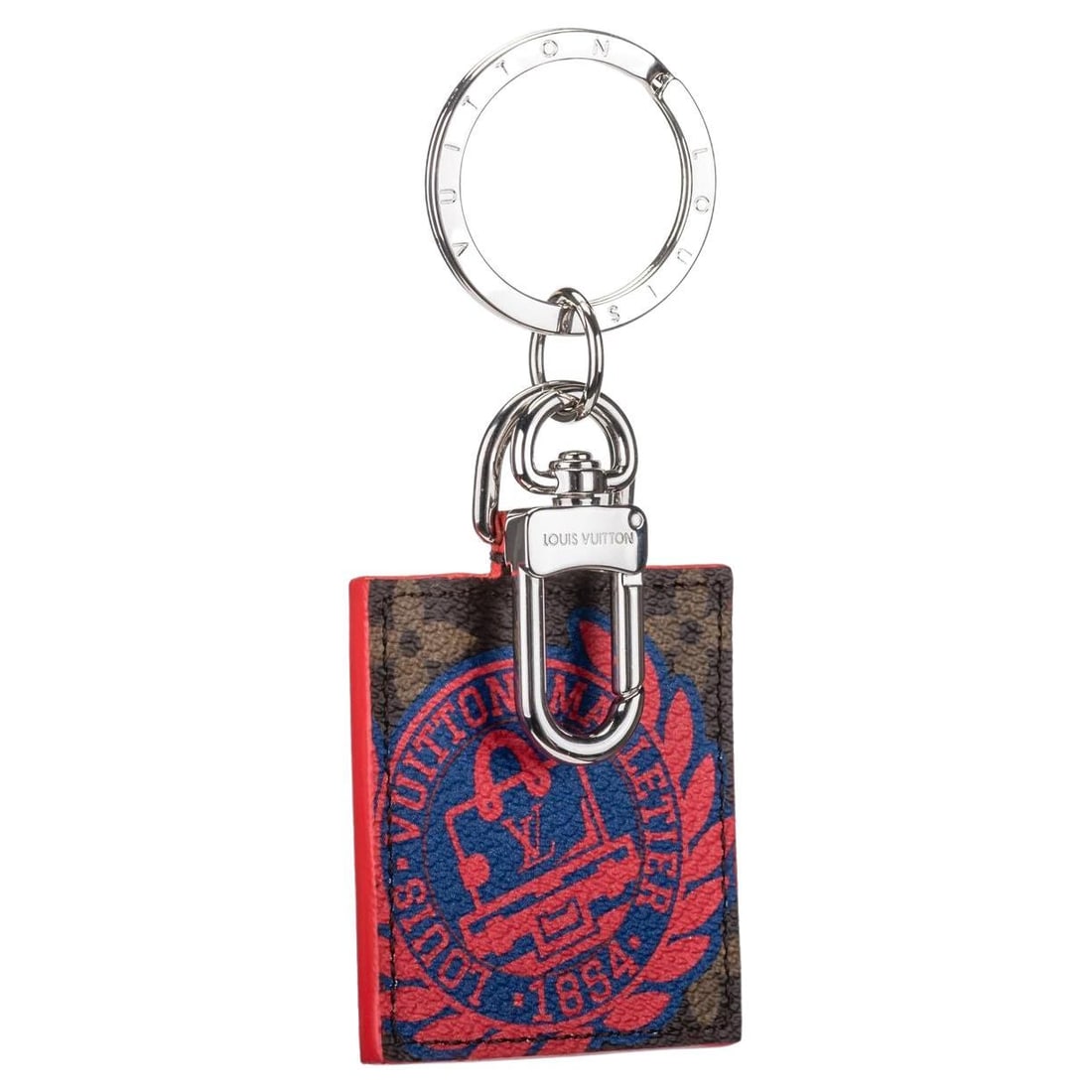 Louis Vuitton Limited Edition Monogram Bag Charm Red Blue: Louis Vuitton Limited Edition Monogram Bag Charm Red Blue This Louis Vuitton limited edition bag charm features a striking red-and-blue design, perfect for adding a touch of luxury to your accessories