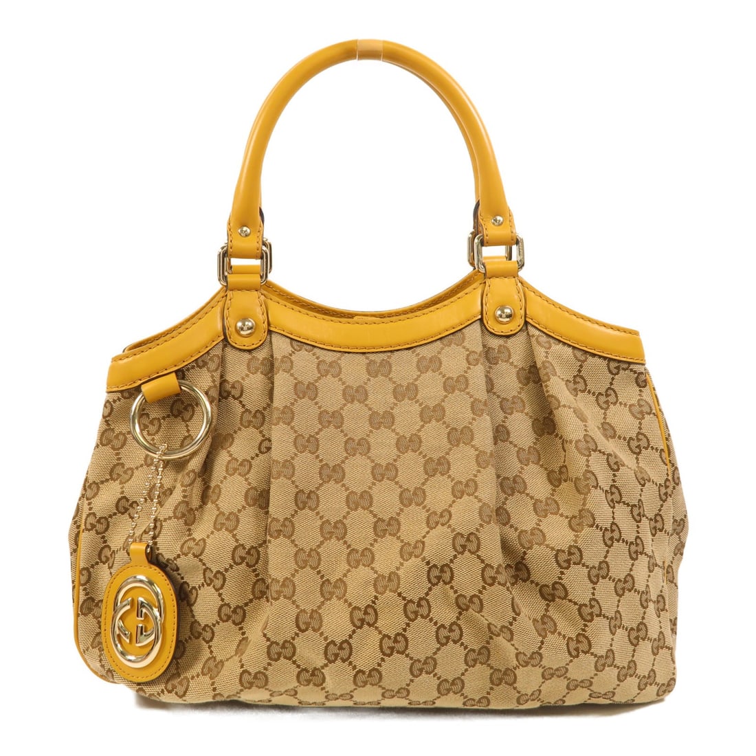 Gucci Sukey Canvas Shoulder Bag with Gold Hardware in Brown and Yellow: Gucci Sukey Canvas Shoulder Bag with Gold Hardware in Brown and Yellow This GUCCI Sukey shoulder bag features a brown and yellow canvas exterior with gold-tone hardware. The bag is designed with a reg