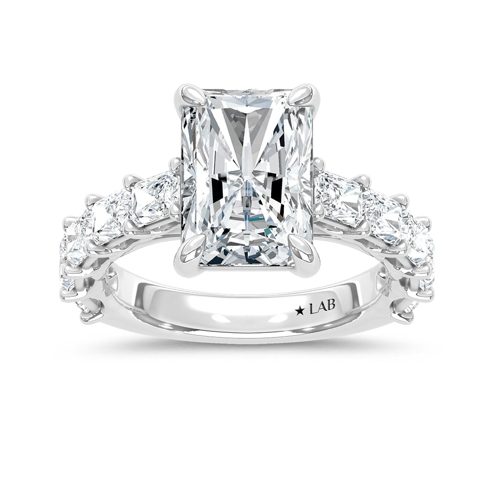 14K White Gold Lab Grown Diamond Elongated Radiant 8 Ct.Tw. Engagement Ring (IGI Certified Center: 14K White Gold Lab Grown Diamond Elongated Radiant 8 Ct.Tw. Engagement Ring (IGI Certified Center 5ct) This elegant diamond engagement ring crafted in 14k White gold, features a Radiant-cut center sto