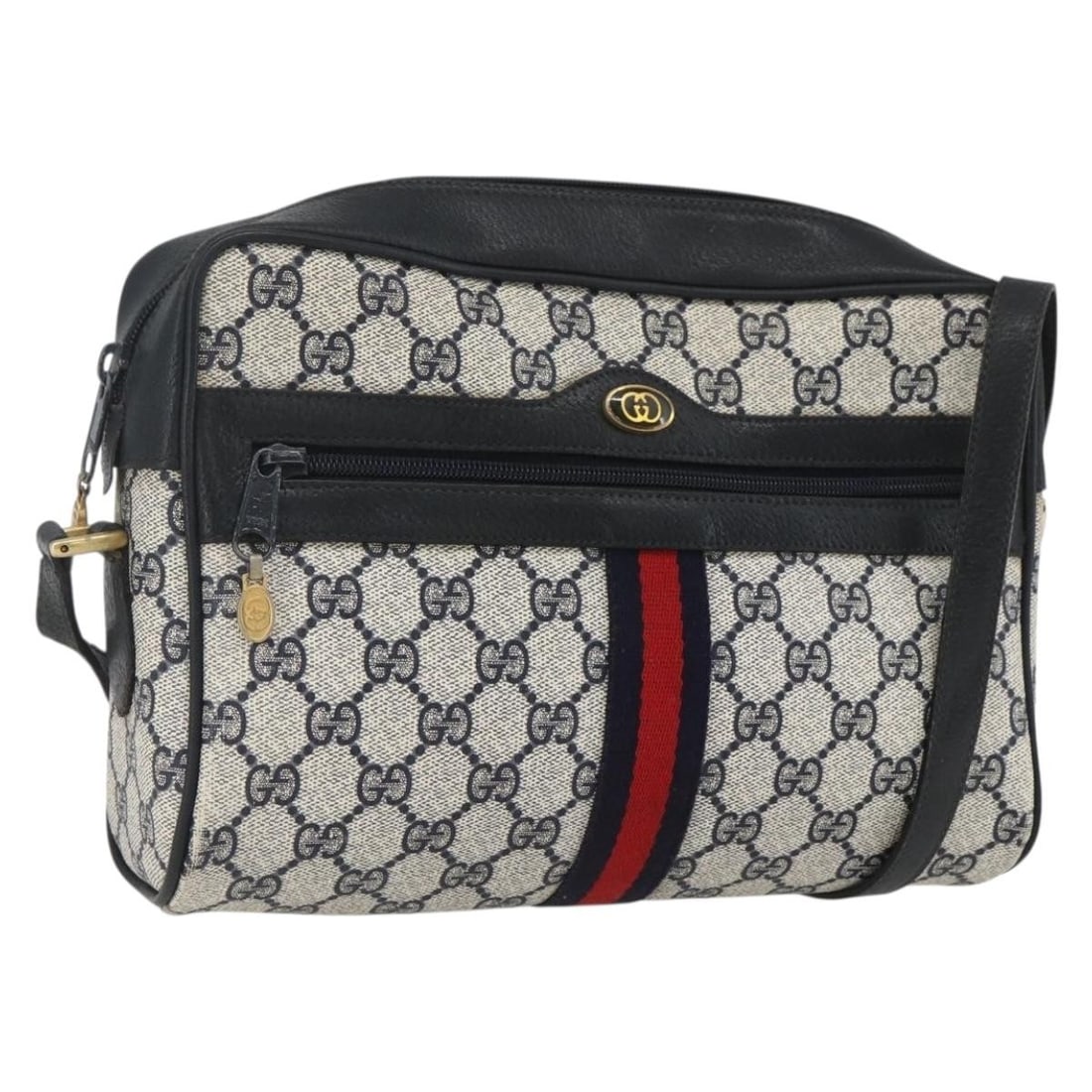 Navy PVC GG Supreme Shoulder Bag by Gucci with Sherry Stripe 72 02 005: Navy PVC GG Supreme Shoulder Bag by Gucci with Sherry Stripe 72 02 005 This is a Gucci GG Supreme Sherry Line shoulder bag crafted from PVC leather and GG canvas in navy, gold, and red. The bag is mad