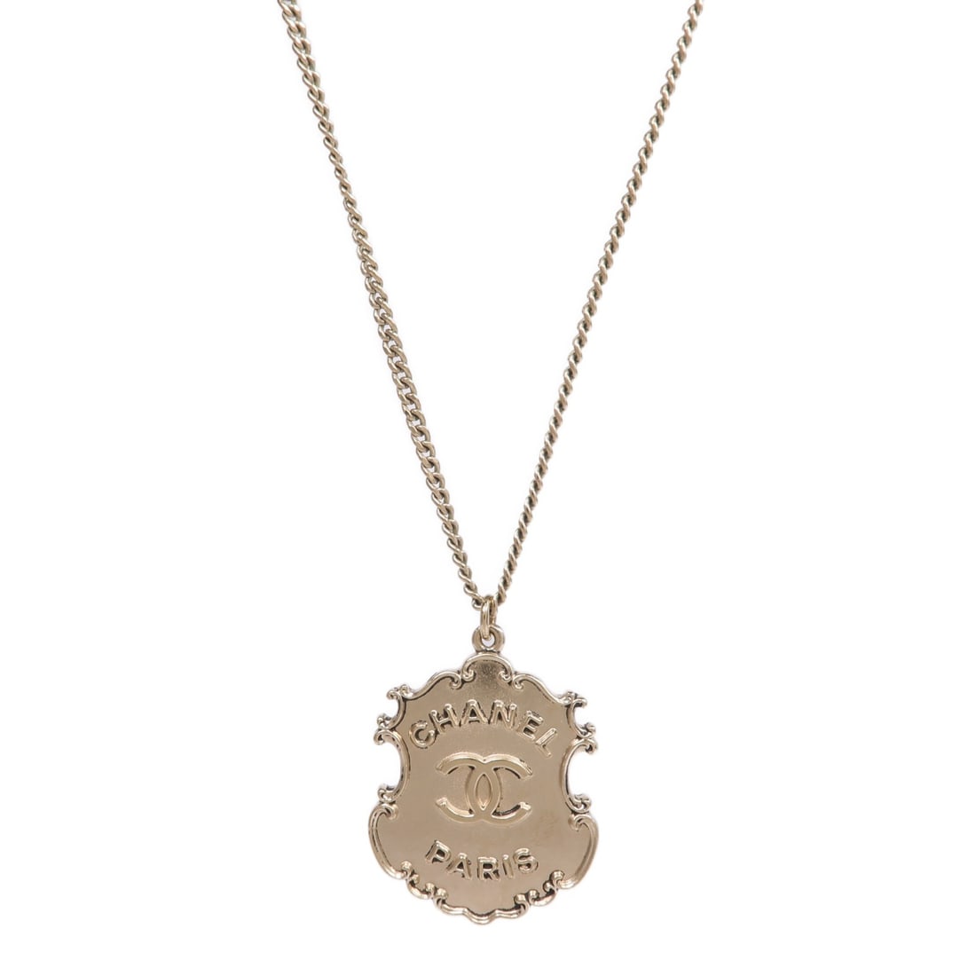 Gold Tone CHANEL CC Pendant Necklace Fashion Jewelry: Gold Tone CHANEL CC Pendant Necklace Fashion Jewelry This CHANEL necklace features the iconic CC logo, crafted from gold-toned metal. It is designed without a main stone and showcases a classic, elega