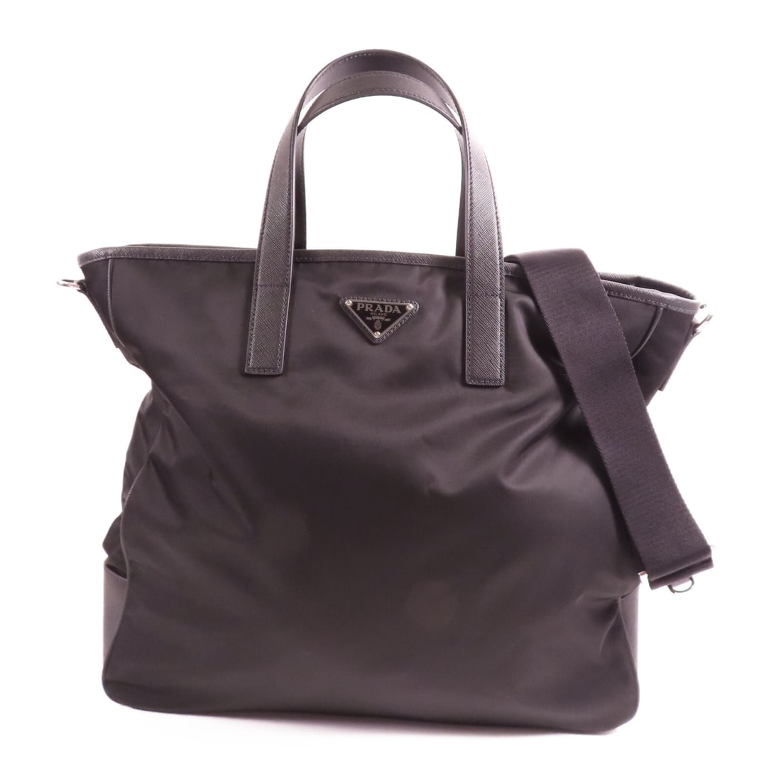PRADA 2 Way Shoulder Bag Black Nylon Stylish Versatile: PRADA 2 Way Shoulder Bag Black Nylon Stylish Versatile Elevate your style with this PRADA 2 Way Shoulder Bag, crafted from durable nylon in a classic black hue. This versatile bag features a spacious