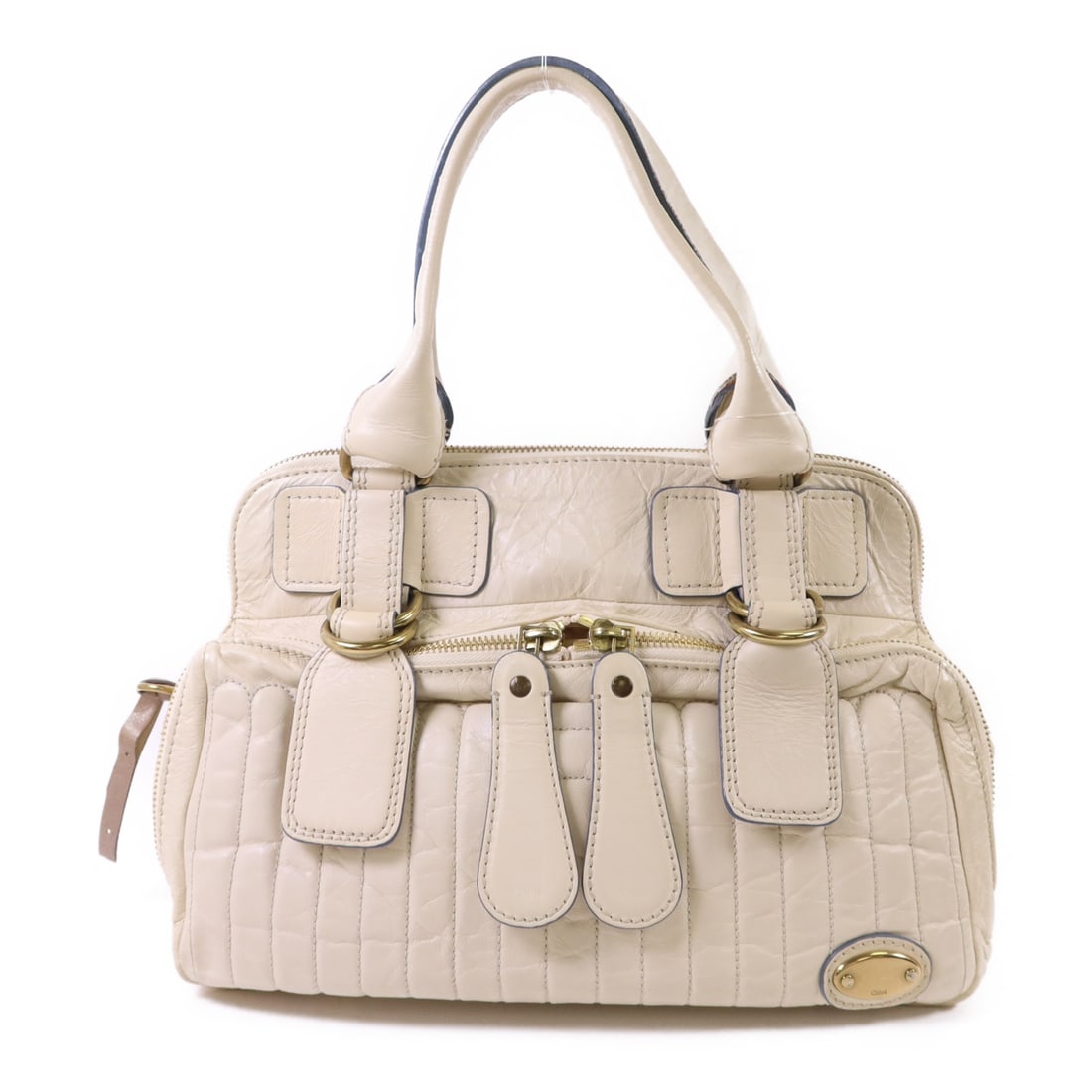 Chloe Beige Calfskin Leather Handbag with Gold Tone Hardware: Chloe Beige Calfskin Leather Handbag with Gold Tone Hardware This Chloe handbag features a beige calfskin leather exterior and offers a spacious interior. Designed in a regular size, it is crafted in