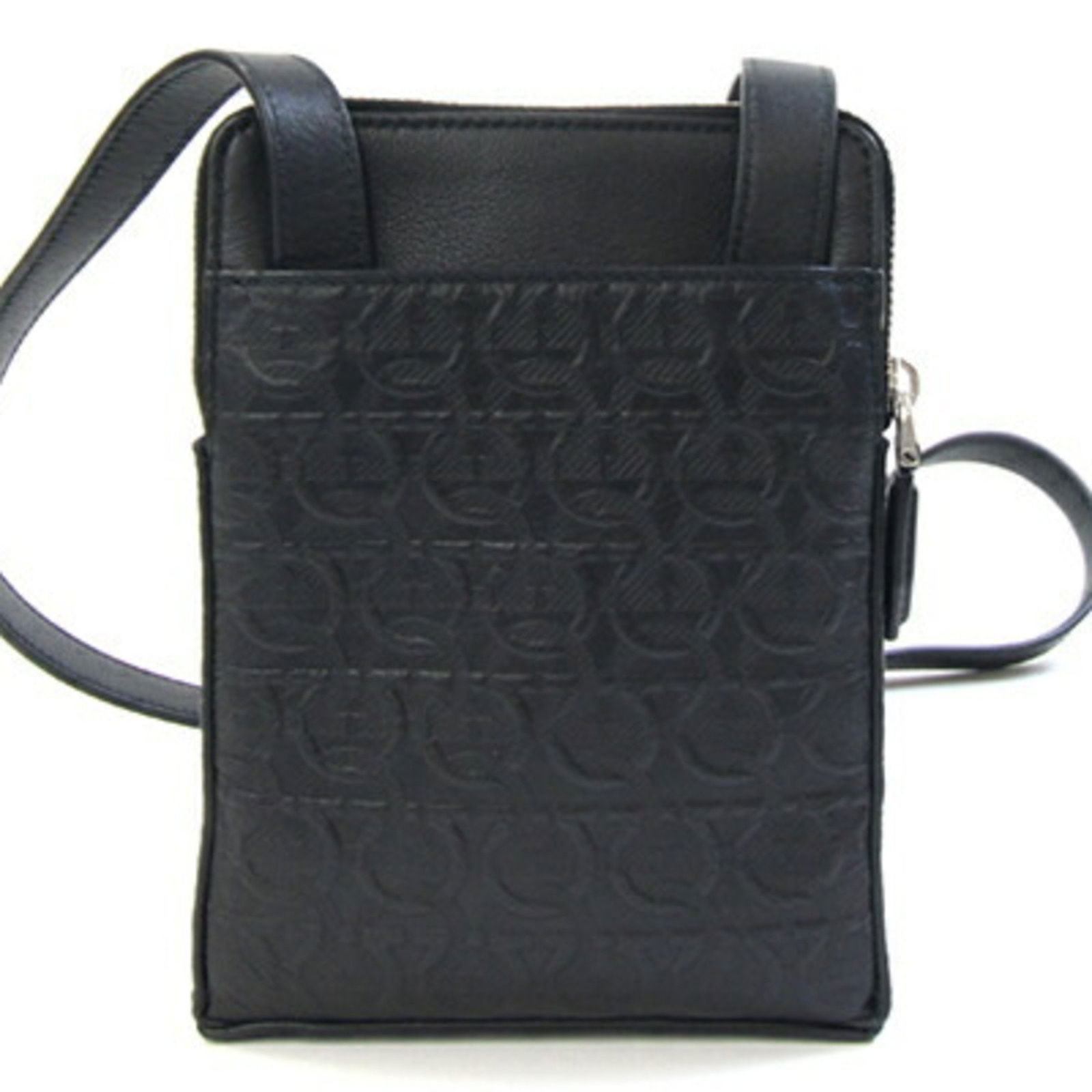 Black Leather Pouch by Salvatore Ferragamo from Italy: Black Leather Pouch by Salvatore Ferragamo from Italy This Salvatore Ferragamo bag is crafted from black leather and features a unisex design. It is made in Italy and offers a compact and practical st