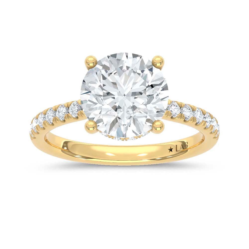 14K Yellow Gold Lab Grown Diamond 2 3/8 Ct.Tw. Round Hidden Halo Engagement Ring (IGI Certified: 14K Yellow Gold Lab Grown Diamond 2 3/8 Ct.Tw. Round Hidden Halo Engagement Ring (IGI Certified Center 2ct) Discover subtle brilliance and modern elegance with our Hidden Halo Diamond Engagement Ring.