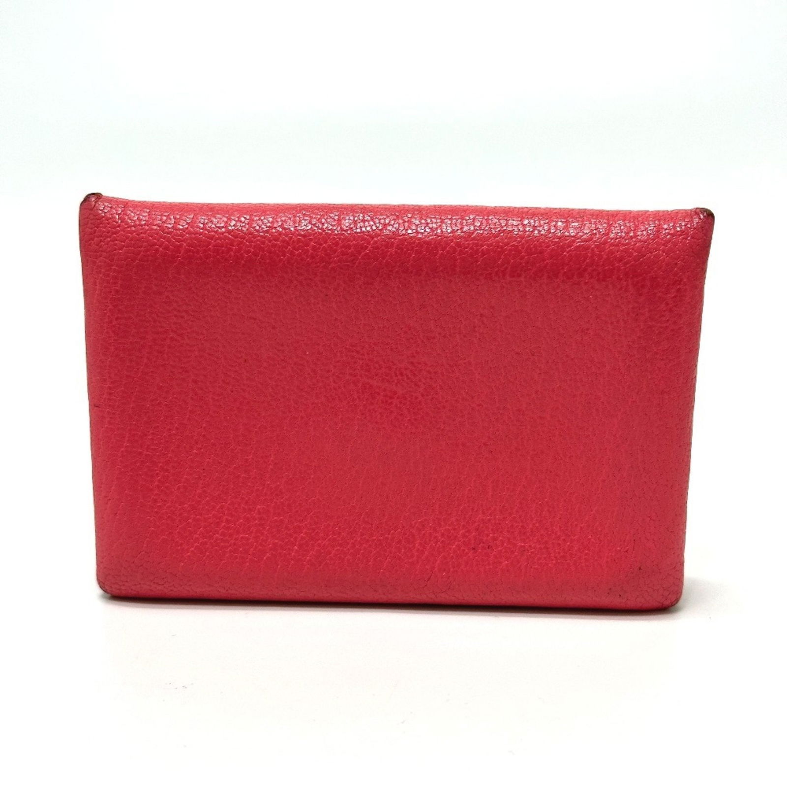 Pink Leather Calvi Card Holder by Hermes France: Pink Leather Calvi Card Holder by Hermes France This Hermes Calvi card holder features a pink leather exterior with a compact and practical design. Suitable for all genders, it is crafted in France an