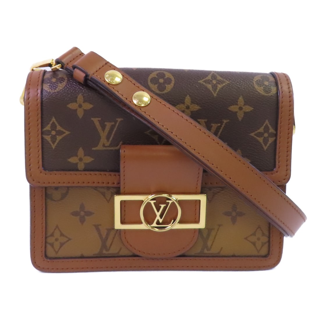 Louis Vuitton Mini Dauphine Shoulder Bag Monogram Reverse Canvas Brown M44580: Louis Vuitton Mini Dauphine Shoulder Bag Monogram Reverse Canvas Brown M44580 This Louis Vuitton Mini Dauphine shoulder bag features the iconic Monogram Reverse design in brown with gold-tone hardware