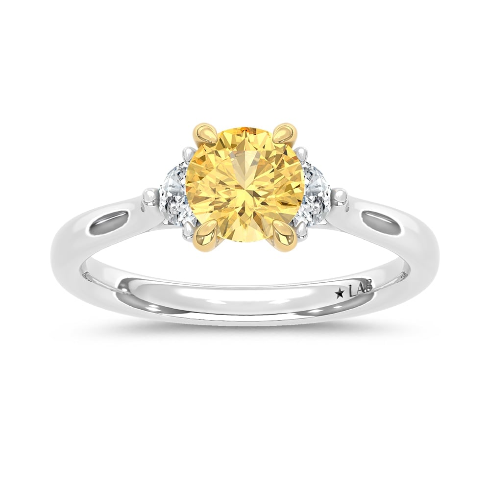 14K Two Tone Gold Lab Grown Yellow Diamond 1 1/6 Ct.Tw. Engagement Ring (Center 1ct): 14K Two Tone Gold Lab Grown Yellow Diamond 1 1/6 Ct.Tw. Engagement Ring (Center 1ct) Celebrate love with refined elegance with this 14K Two-Tone Gold Engagement Ring, featuring a radiant 1-carat lab-g