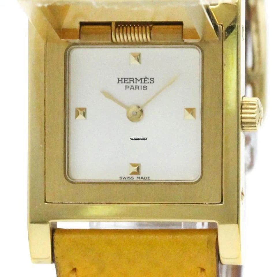Hermes Medor Ladies Watch White Dial Leather Strap Ref MEDOR: Hermes Medor Ladies Watch White Dial Leather Strap Ref MEDOR This Hermes Medor watch features a white dial and a leather bracelet, designed specifically for ladies. The timepiece is part of the Medor