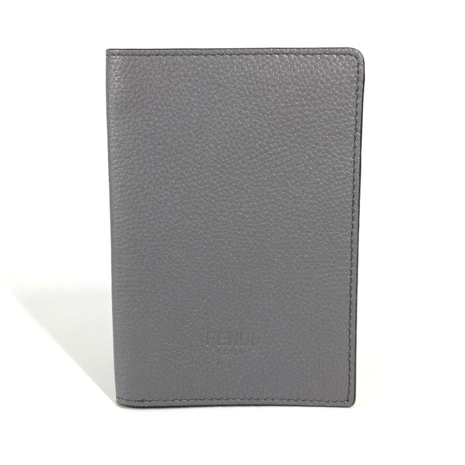 Grey Leather Unisex Wallet by Fendi Italy: Grey Leather Unisex Wallet by Fendi Italy This Fendi item is crafted from grey leather and features a compact design suitable for various uses. It is sized at 14.5 cm wide, 10 cm high, and 1 cm deep.