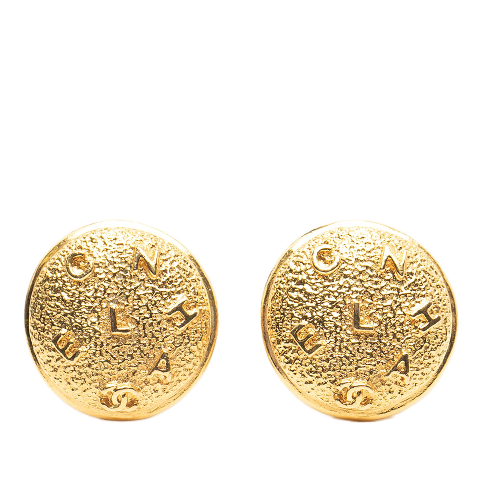 Chanel Gold Plated Round Clip On Earrings: Chanel Gold Plated Round Clip On Earrings Elevate your accessory collection with these stunning Chanel Gold Plated Logo Round Clip On Earrings. Crafted from gold-tone metal, these earrings showcase a
