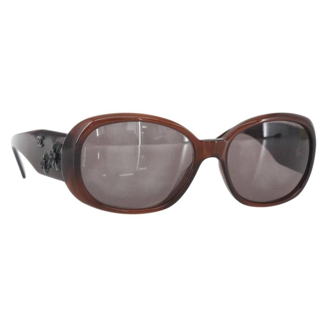 Brown Camelia 5113-A Sunglasses by CHANEL with Case: Brown Camelia 5113-A Sunglasses by CHANEL with Case These CHANEL Camelia sunglasses feature a brown plastic frame and are part of the 5113-A product line. Made in Italy, they come with a sunglass case