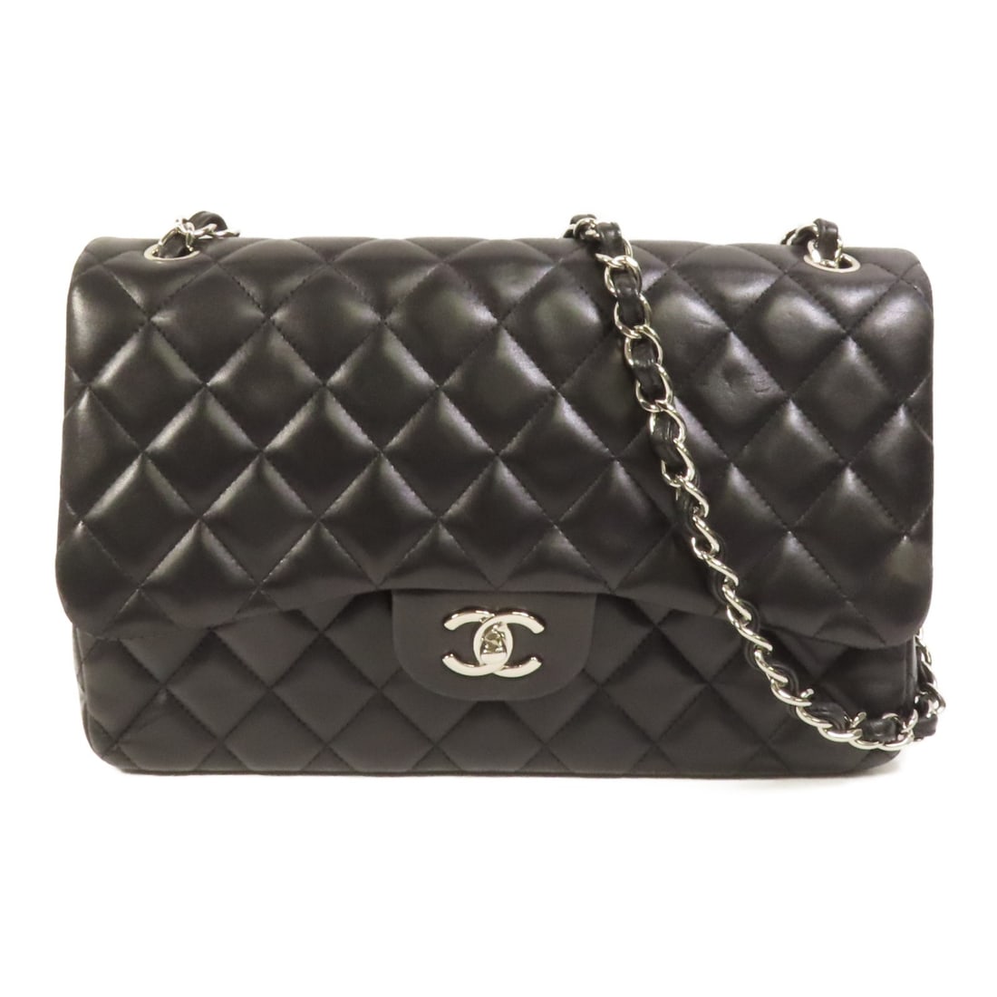 Black Lambskin Large Classic Shoulder Bag by CHANEL with Silver Chain Hardware: Black Lambskin Large Classic Shoulder Bag by CHANEL with Silver Chain Hardware This CHANEL shoulder bag features the iconic CC design with silver-tone hardware and a classic chain strap. Crafted from