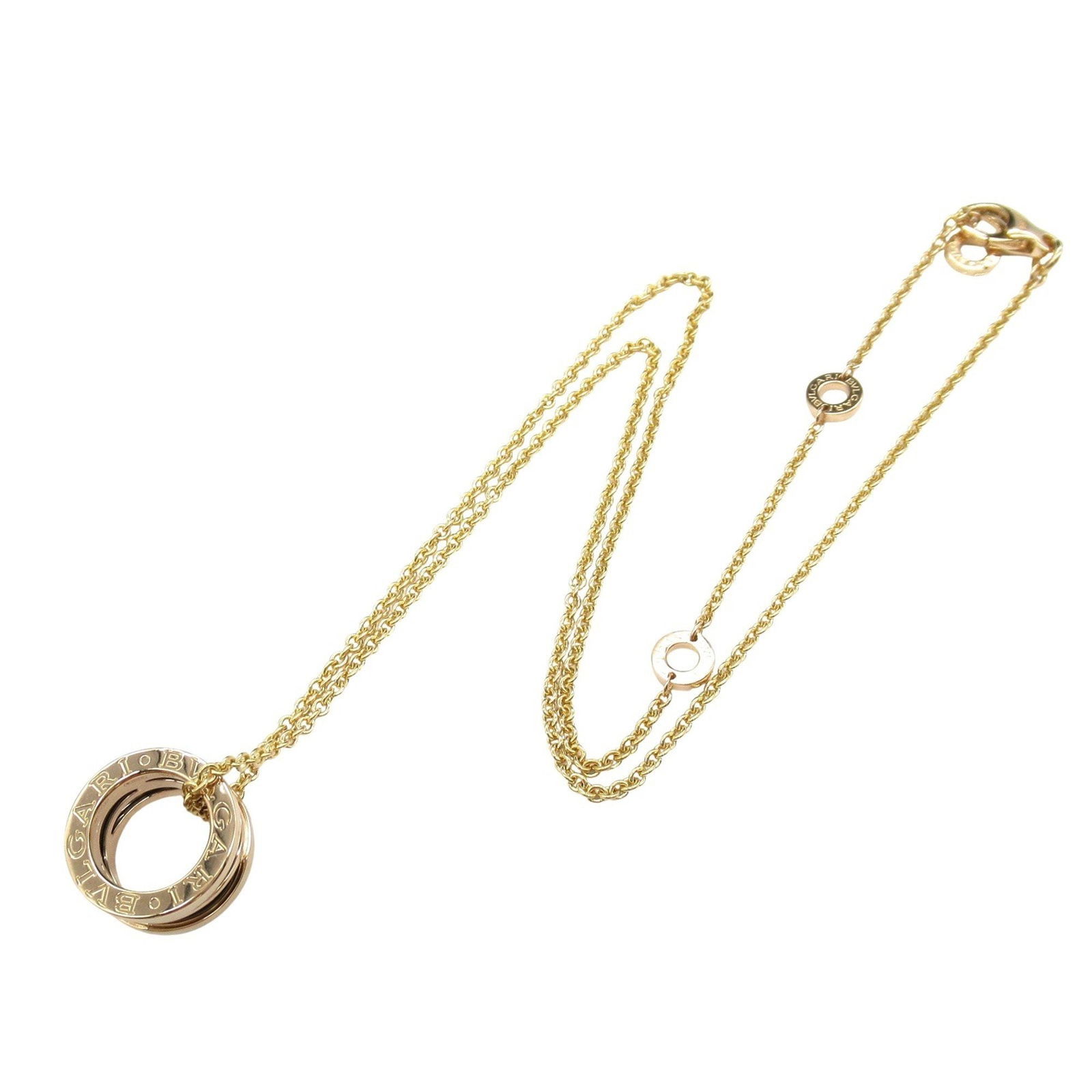 B.Zero1 Necklace 18K Rose Gold and Ceramic by Bulgari: B.Zero1 Necklace 18K Rose Gold and Ceramic by Bulgari This Bulgari B.Zero1 necklace features a blend of 18K rose gold and ceramic, showcasing a distinctive design in gold tone. The necklace measures 1