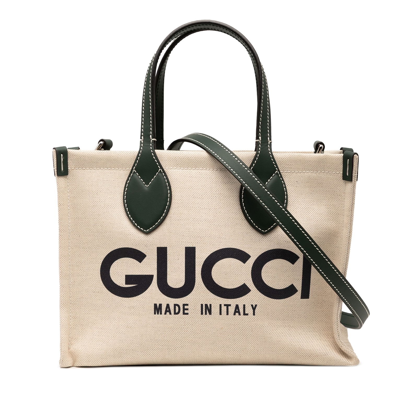 Gucci Medium Canvas Logo Tote Brown Fabric with Leather Handles: Gucci Medium Canvas Logo Tote Brown Fabric with Leather Handles The Gucci Medium Canvas Logo Tote is a stylish and practical satchel bag crafted from durable canvas. It features flat leather handles a
