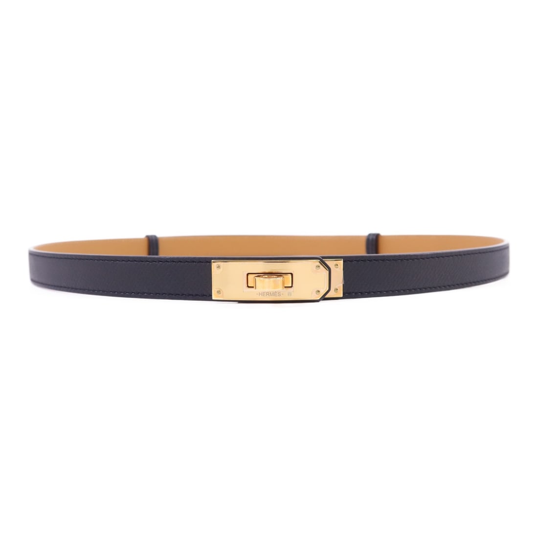 Epsom Leather Kelly Belt with Gold Hardware by Hermes: Epsom Leather Kelly Belt with Gold Hardware by Hermes This Hermes Kelly belt is crafted from Epsom calfskin leather in a gold brown color. The belt features a regular size and is in pristine, un-used