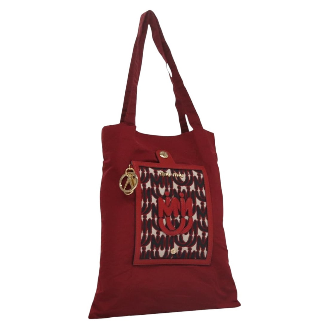Miu Miu Red Nylon Folding Tote Bag Italy Auth 111415V: Miu Miu Red Nylon Folding Tote Bag Italy Auth 111415V This Miu Miu Folding Type Tote Bag is a stylish accessory crafted from durable nylon in a vibrant red color. Measuring approximately 12.2 inches i