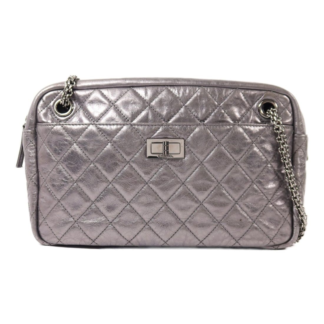 Chanel Silver Calfskin Leather Shoulder Bag with CC Logo and Silver Hardware: Chanel Silver Calfskin Leather Shoulder Bag with CC Logo and Silver Hardware This CHANEL shoulder bag is crafted from calfskin leather in a silver color. The bag features a classic CC design with silv