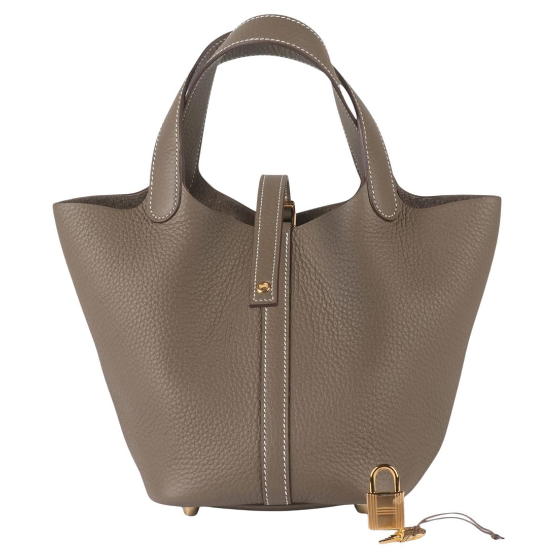 Hermes Etoupe Picotin Lock PM Bag NIB with Dust Bag and Box: Hermes Etoupe Picotin Lock PM Bag NIB with Dust Bag and Box Introducing the Hermes Picotin Lock PM bag, crafted from premium Clemence calfskin leather in the elegant etoupe shade. This stylish bag fea