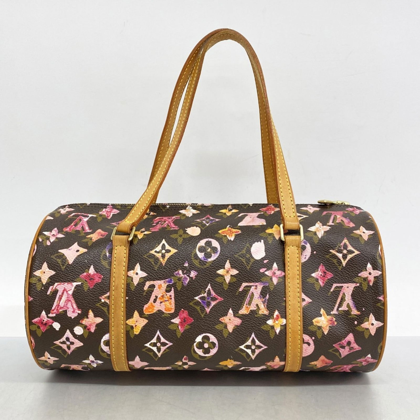 Brown Canvas Papillon 30 Bag by Louis Vuitton with 15cm x 30cm Dimensions: Brown Canvas Papillon 30 Bag by Louis Vuitton with 15cm x 30cm Dimensions The Louis Vuitton Papillon 30 is a women's handbag crafted from brown canvas. Made in France, this bag features a cylindrical