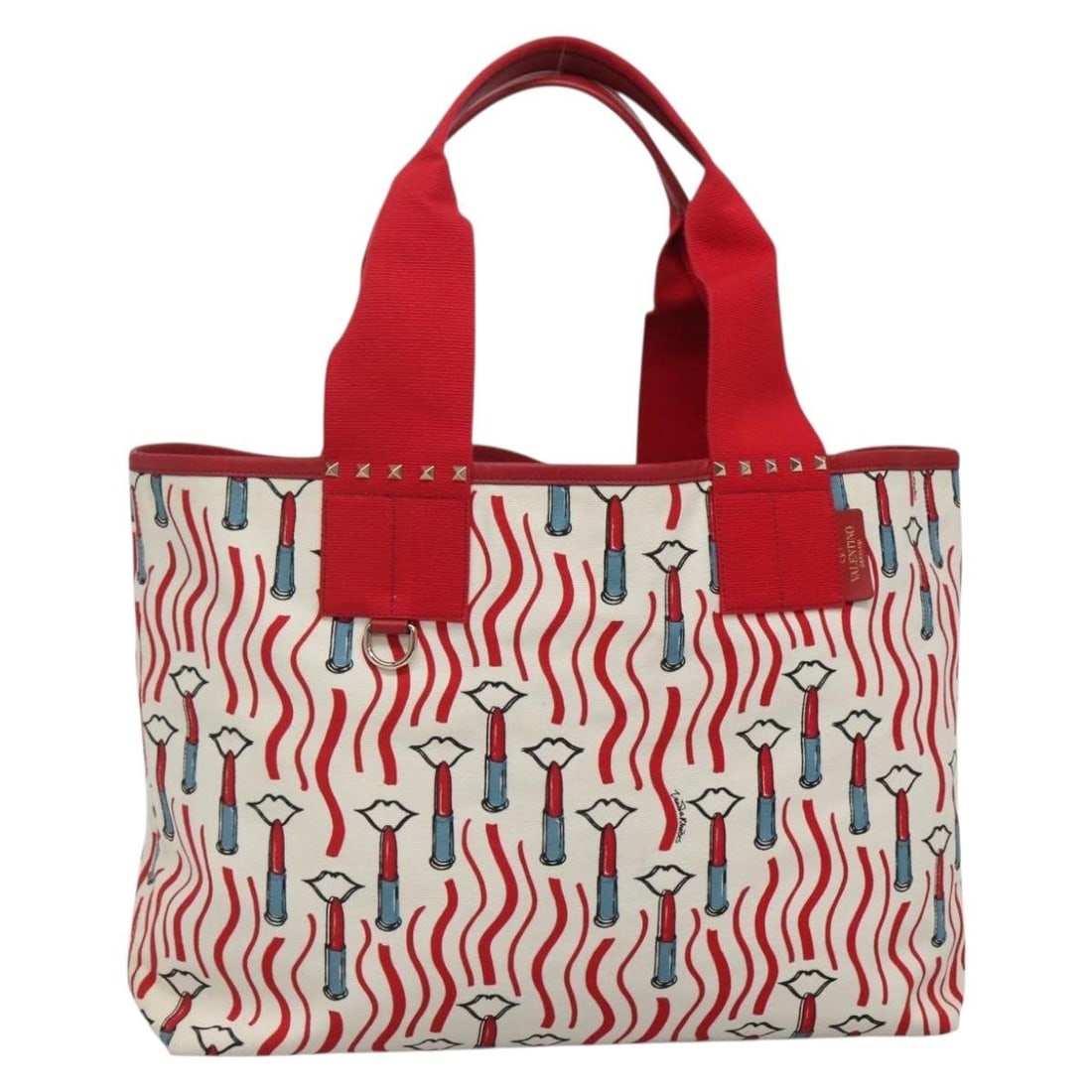 VALENTINO Red Canvas Tote Bag Stylish Accessory: VALENTINO Red Canvas Tote Bag Stylish Accessory This authentic VALENTINO tote bag is crafted from durable canvas in a vibrant red color, making it a stylish addition to your collection. The spacious i