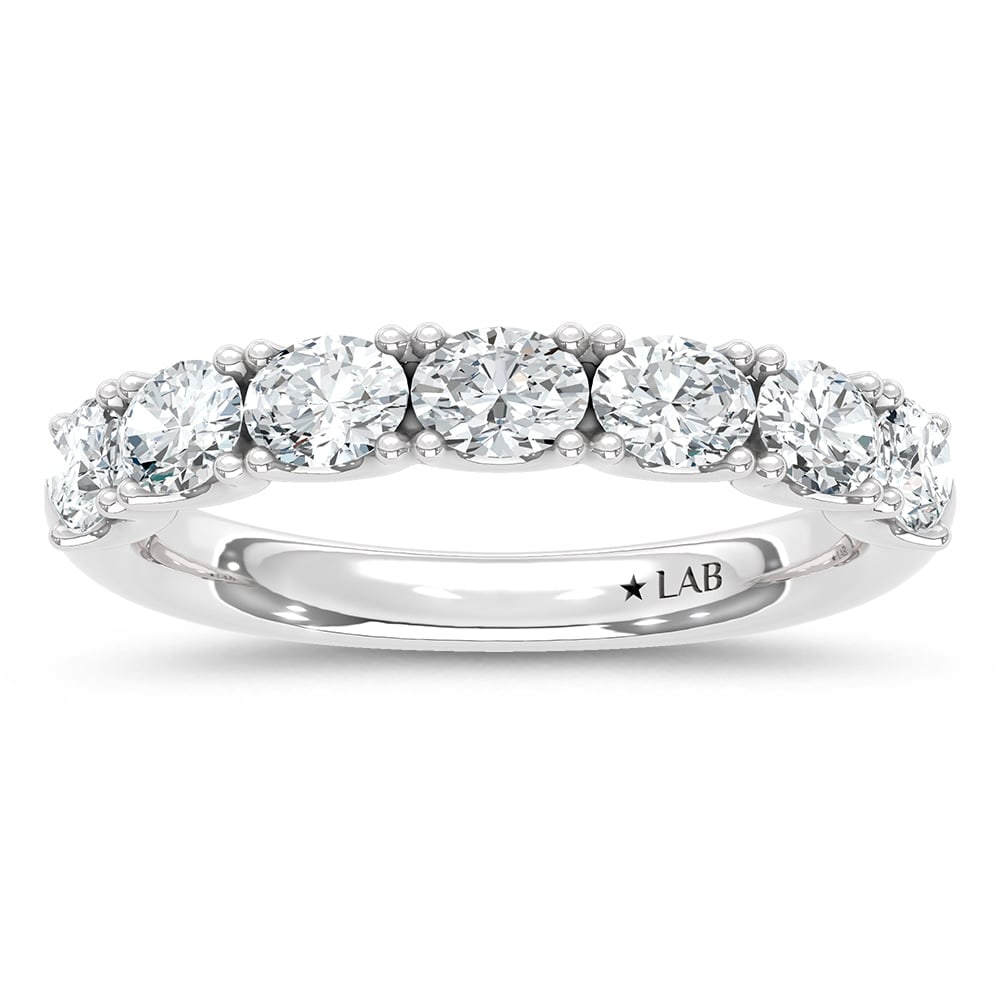 14K White Gold Lab Grown Diamond 1 Ct.Tw. Band: 14K White Gold Lab Grown Diamond 1 Ct.Tw. Band Celebrate love or elevate your everyday style with this timeless 14K white gold diamond band. Featuring 1 carat total weight of lab-grown diamonds, this